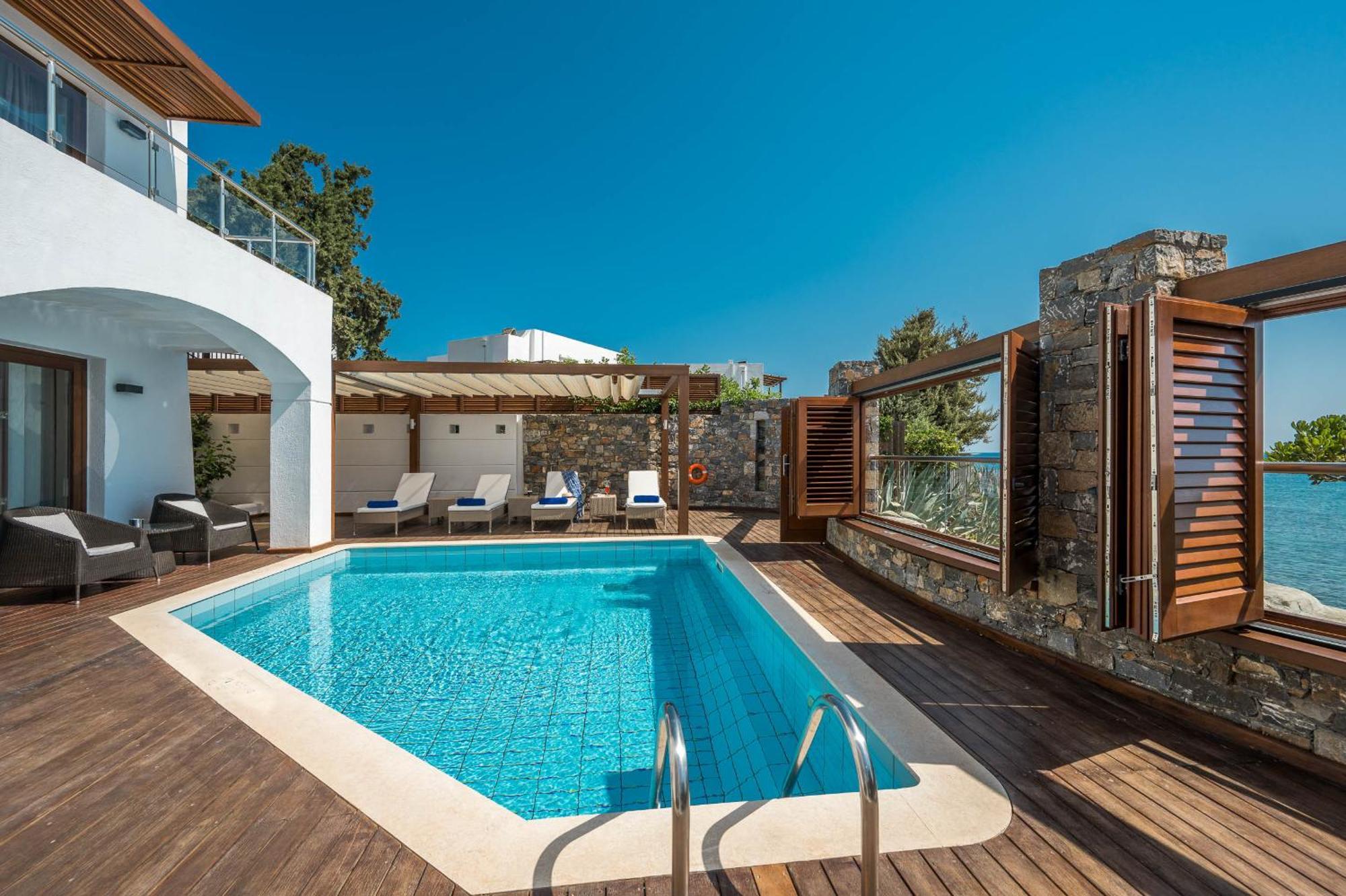 Creta Maris Resort Hersonissos  Esterno foto A private pool at a luxury hotel